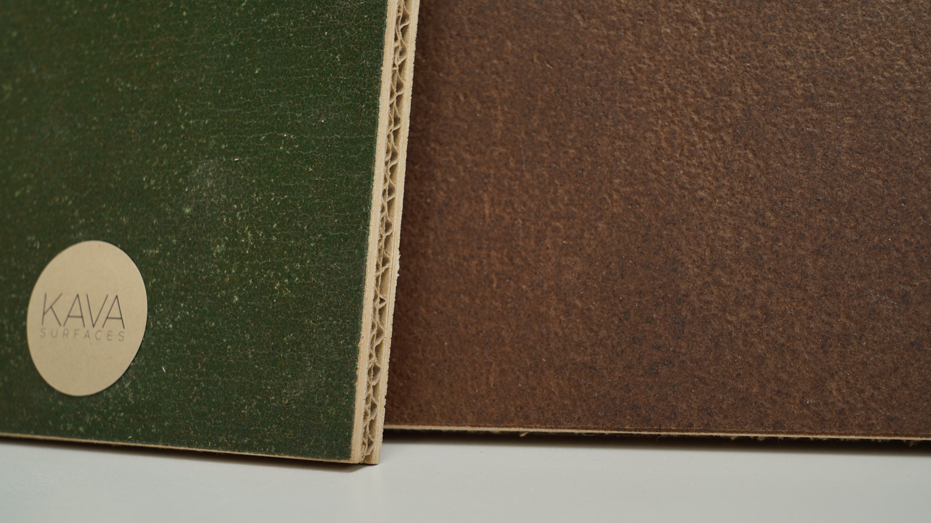 Two Sustainable Ply panels side by side showing different surface finishes